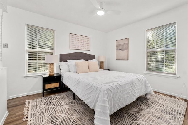 4613 Greenridge Ter, Austin, TX 78745 - bedroom with baseboards, wood finished floors, and a ceiling fan