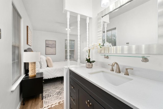 4613 Greenridge Ter, Austin, TX 78745 - ensuite bathroom featuring vanity and wood finished floors