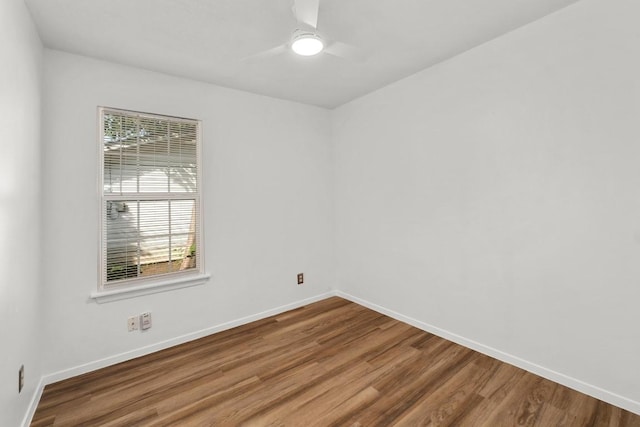 4613 Greenridge Ter, Austin, TX 78745 - spare room featuring wood finished floors, baseboards, and ceiling fan