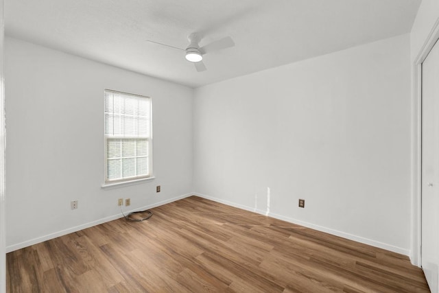 4613 Greenridge Ter, Austin, TX 78745 - empty room with ceiling fan, wood finished floors, and baseboards