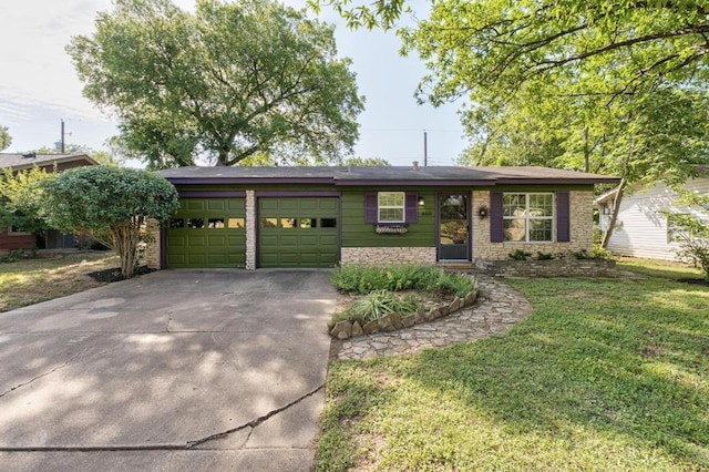 4613 Greenridge Ter, Austin, TX 78745 - ranch-style house with an attached garage, driveway, and a front lawn