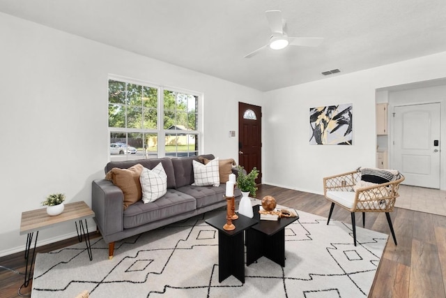 4613 Greenridge Ter, Austin, TX 78745 - living area with wood finished floors, a ceiling fan, and baseboards