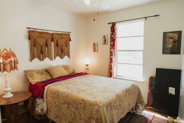 1305 Larkspur Rd, Austin, TX 78758 - bedroom featuring wood finished floors and ceiling fan