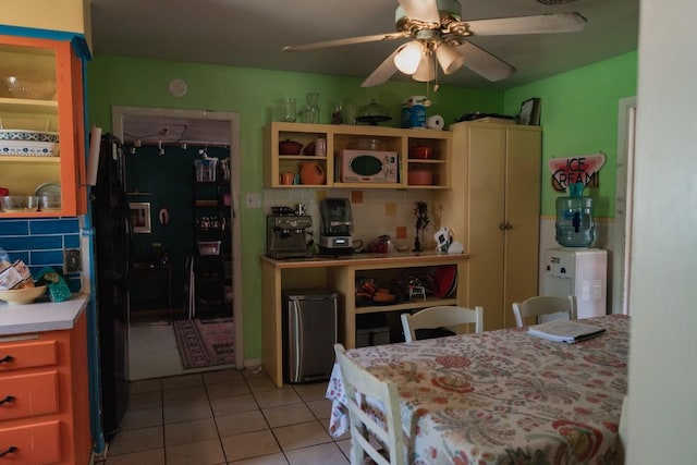 1305 Larkspur Rd, Austin, TX 78758 - dining room with light tile patterned flooring and ceiling fan