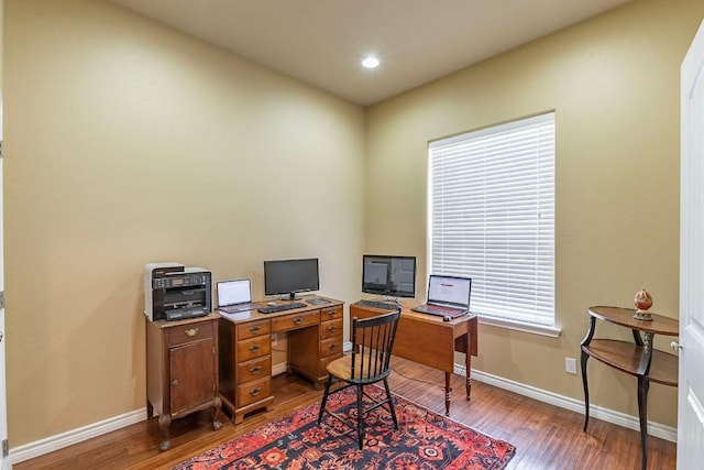 office with wood finished floors, baseboards, and recessed lighting