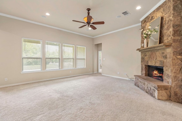 15105 General Williamson Dr, Austin, TX 78734 - unfurnished living room featuring carpet floors, a fireplace, ceiling fan, crown molding, and recessed lighting