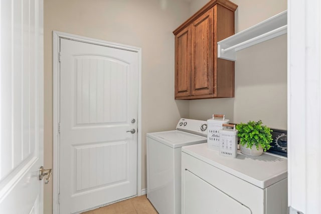 15105 General Williamson Dr, Austin, TX 78734 - washroom with washer and dryer, cabinet space, and light tile patterned floors