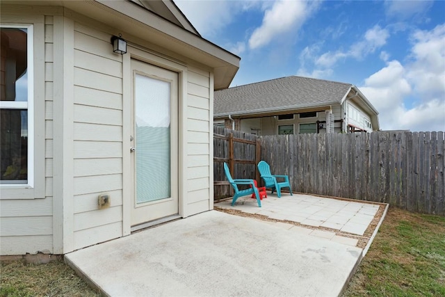 view of patio with fence