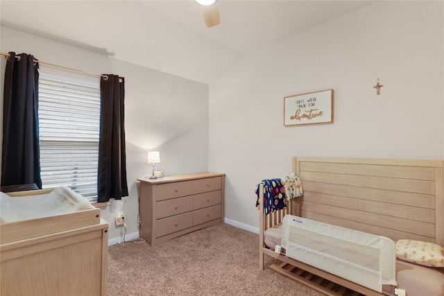 bedroom with baseboards, light carpet, and a ceiling fan
