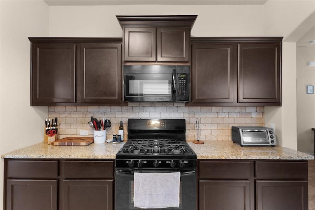 kitchen featuring black appliances, dark brown cabinets, backsplash, and light stone countertops