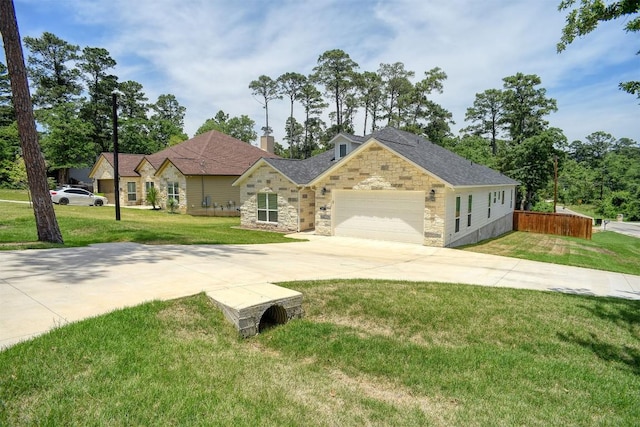 102 Kaena Ln, Bastrop, TX 78602 - view of front facade with concrete driveway, a garage, stone siding, and a chimney