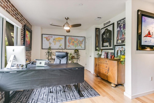 3200 Grandview St Unit 15, Austin, TX 78705 - home office with wood finished floors, ceiling fan, and baseboards
