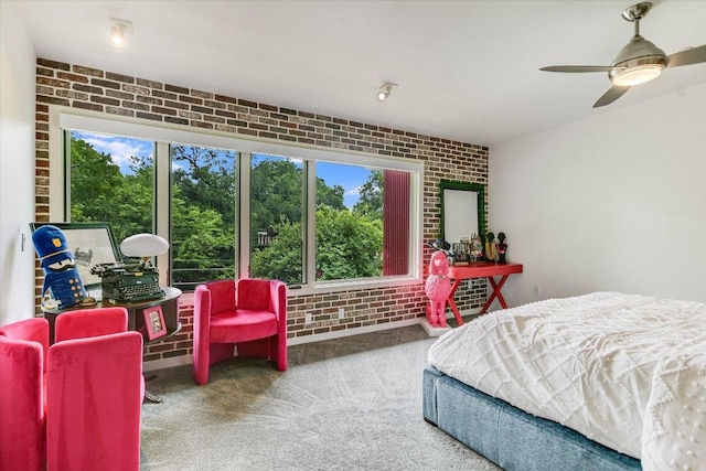 3200 Grandview St Unit 15, Austin, TX 78705 - carpeted bedroom featuring brick wall and ceiling fan