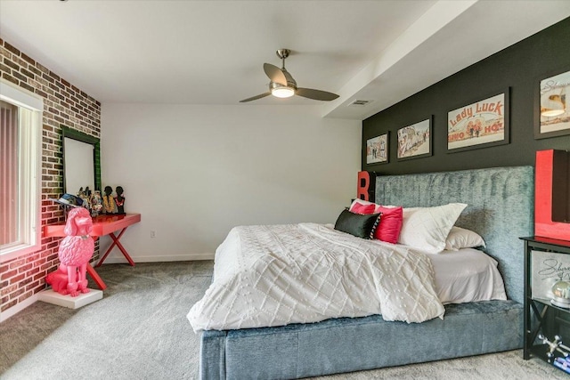 3200 Grandview St Unit 15, Austin, TX 78705 - carpeted bedroom with brick wall, a ceiling fan, and baseboards