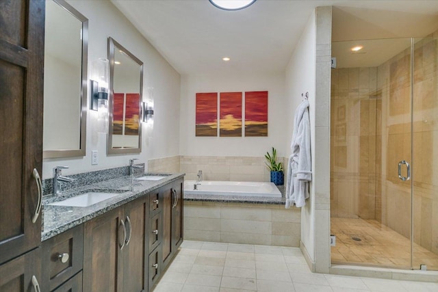 3200 Grandview St Unit 15, Austin, TX 78705 - bathroom featuring a shower stall, tile patterned floors, a bath, double vanity, and recessed lighting