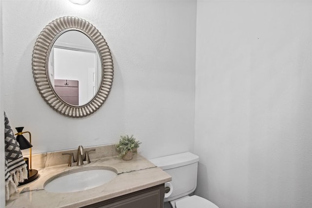 701 W Esparada Dr, Georgetown, TX 78628 - bathroom with toilet and vanity