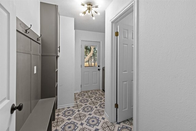 701 W Esparada Dr, Georgetown, TX 78628 - mudroom featuring baseboards