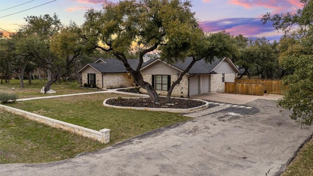 701 W Esparada Dr, Georgetown, TX 78628 - ranch-style home featuring driveway and an attached garage