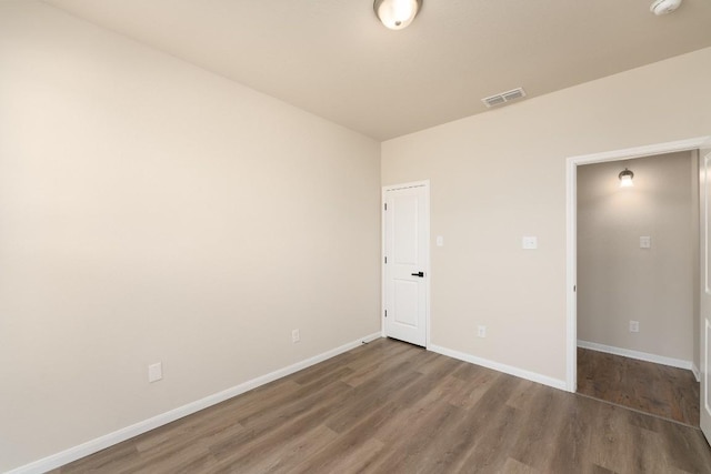 7317 Buffalo Grass Dr, Temple, TX 76502 - unfurnished bedroom featuring wood finished floors and baseboards