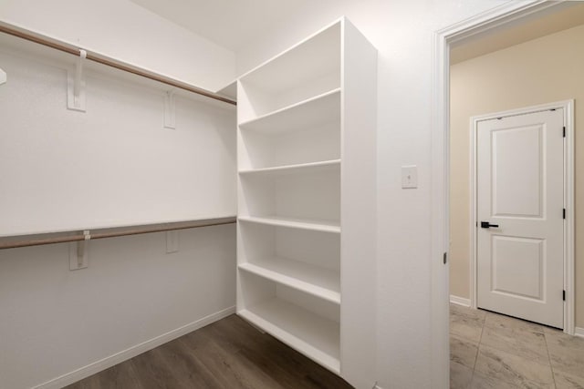 7317 Buffalo Grass Dr, Temple, TX 76502 - walk in closet featuring wood finished floors