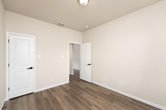7317 Buffalo Grass Dr, Temple, TX 76502 - unfurnished bedroom featuring wood finished floors and baseboards