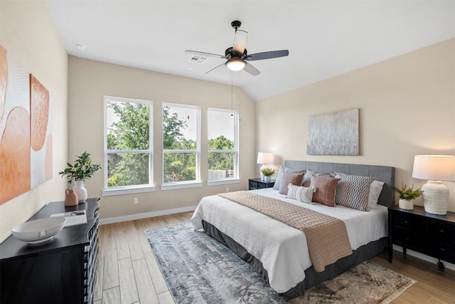 324 Pisa Ln, Georgetown, TX 78628 - bedroom with wood finished floors, baseboards, and a ceiling fan