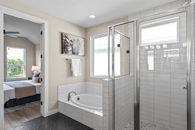 324 Pisa Ln, Georgetown, TX 78628 - ensuite bathroom with a garden tub, a stall shower, tile patterned flooring, ceiling fan, and recessed lighting
