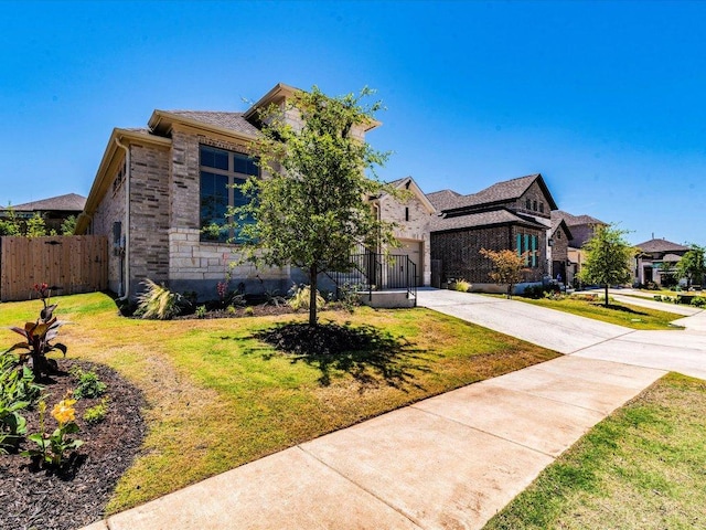 view of front facade featuring concrete driveway and a garage
