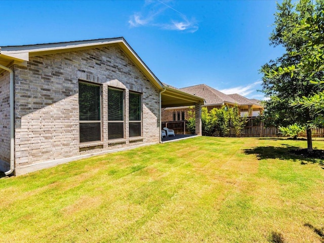 rear view of property featuring brick siding