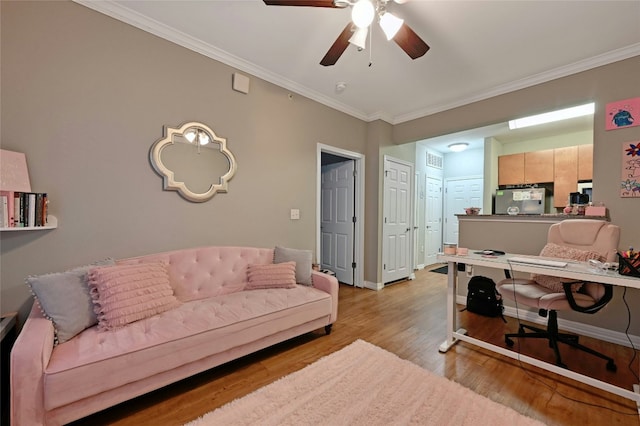 2502 Leon St Unit 213, Austin, TX 78705 - home office featuring ornamental molding, light wood-style floors, ceiling fan, and baseboards