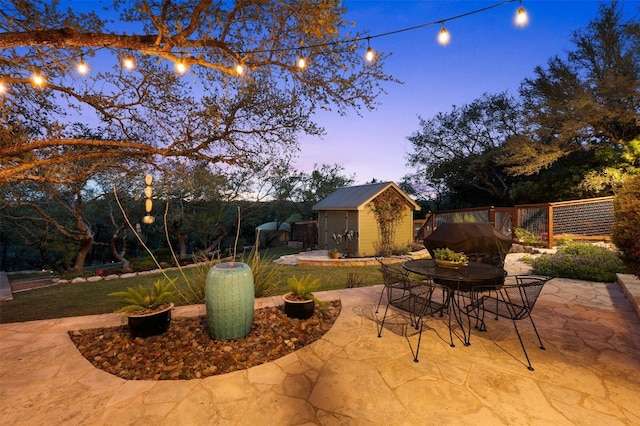 12316 Triple Creek Dr, Dripping Springs, TX 78620 - patio terrace at dusk featuring a patio and outdoor dining space