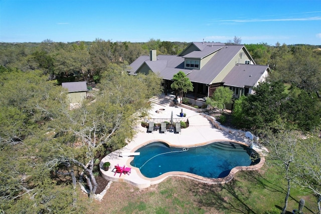 12316 Triple Creek Dr, Dripping Springs, TX 78620 - aerial view of property and surrounding area featuring a pool area and a heavily wooded area