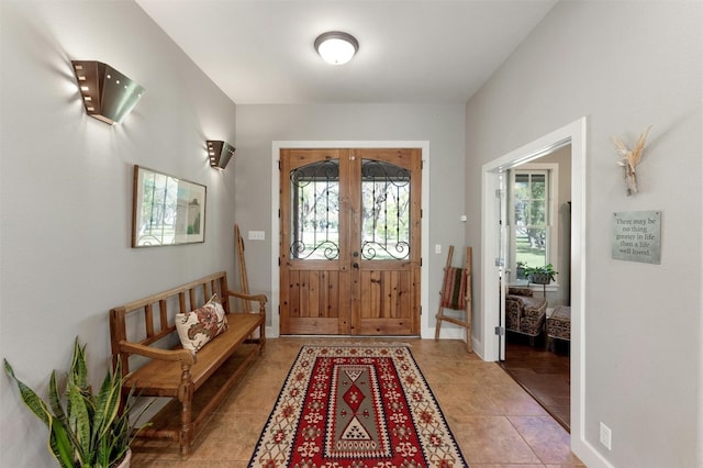 12316 Triple Creek Dr, Dripping Springs, TX 78620 - entryway featuring healthy amount of natural light, french doors, and baseboards
