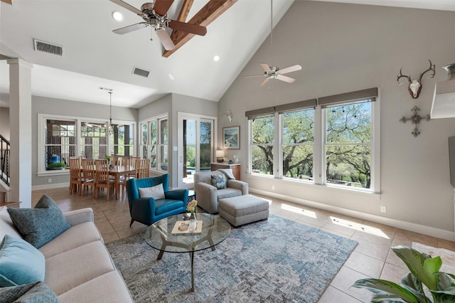 12316 Triple Creek Dr, Dripping Springs, TX 78620 - living room with a ceiling fan, tile patterned flooring, high vaulted ceiling, baseboards, and stairway