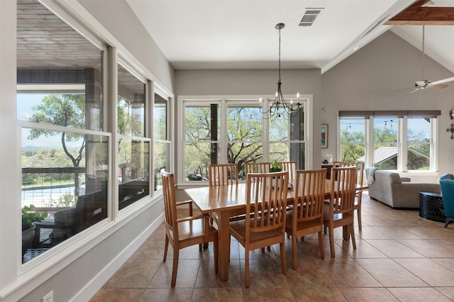 12316 Triple Creek Dr, Dripping Springs, TX 78620 - dining space with a chandelier, tile patterned flooring, ceiling fan, vaulted ceiling, and baseboards