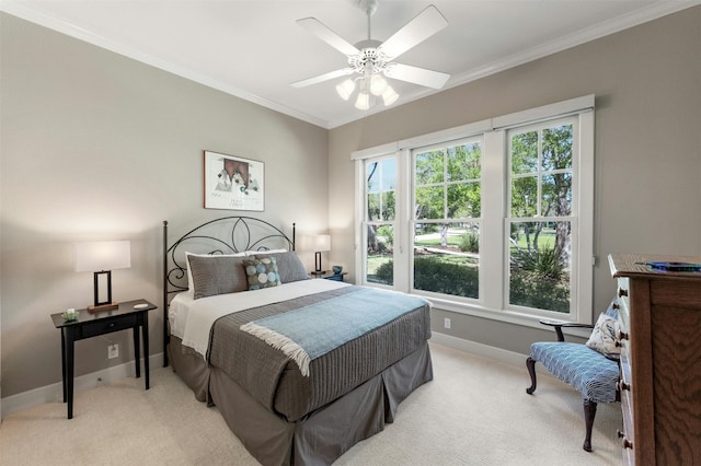 12316 Triple Creek Dr, Dripping Springs, TX 78620 - bedroom with light carpet, baseboards, ornamental molding, and a ceiling fan