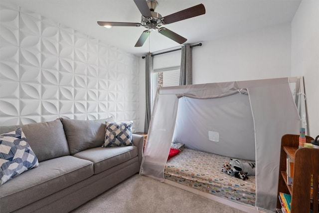 carpeted bedroom featuring a ceiling fan