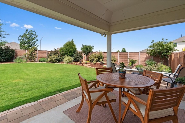 view of patio featuring outdoor dining space