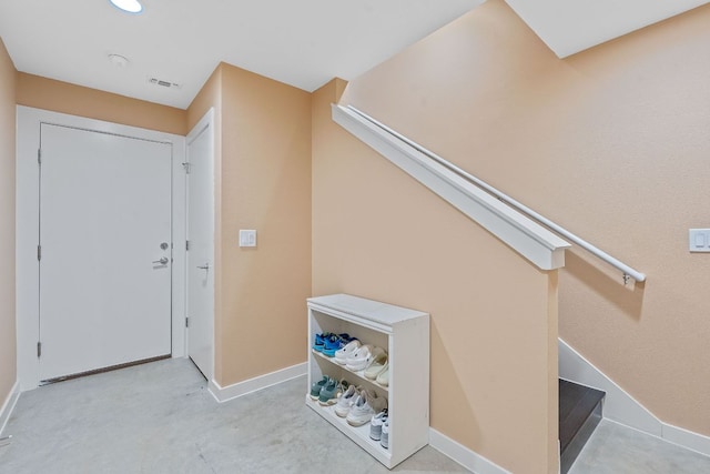 3105 Aldwyche Dr, Austin, TX 78704 - foyer with baseboards, stairway, and carpet floors