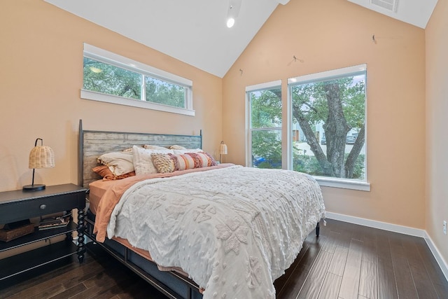 3105 Aldwyche Dr, Austin, TX 78704 - bedroom with dark wood finished floors, baseboards, and high vaulted ceiling