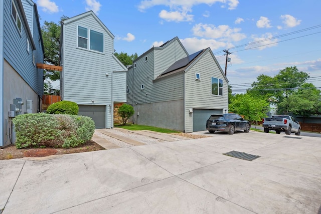 3105 Aldwyche Dr, Austin, TX 78704 - view of home's exterior with driveway and a garage