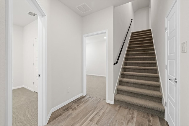 5213 Fresno Ave, Pflugerville, TX 78660 - stairs with wood finished floors and baseboards