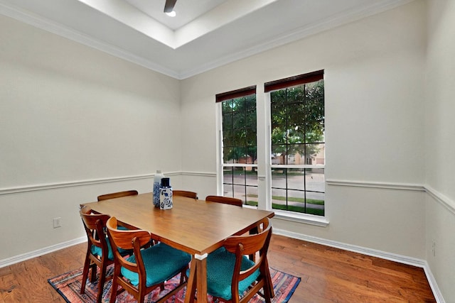 16525 Broadbay Dr, Austin, TX 78717 - dining room with a raised ceiling, wood finished floors, baseboards, and crown molding