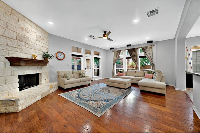 16525 Broadbay Dr, Austin, TX 78717 - living room featuring a ceiling fan, hardwood / wood-style floors, a stone fireplace, baseboards, and recessed lighting