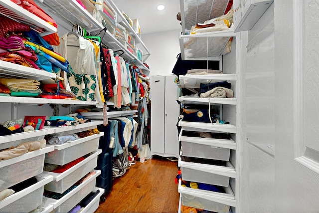 16525 Broadbay Dr, Austin, TX 78717 - walk in closet featuring wood finished floors
