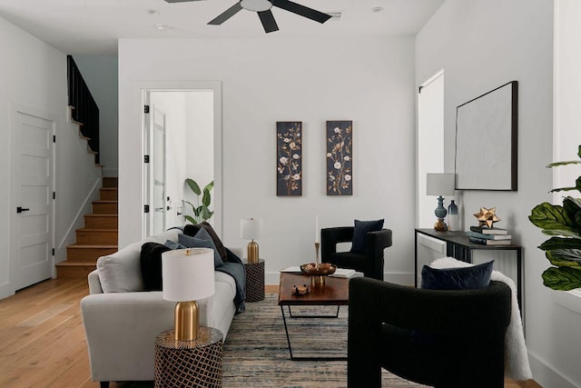 1140 Northwestern Ave Unit 2, Austin, TX 78702 - living area with stairs, a ceiling fan, and light wood-type flooring