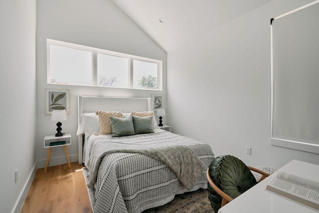 1140 Northwestern Ave Unit 2, Austin, TX 78702 - bedroom featuring vaulted ceiling and wood finished floors