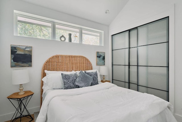 1140 Northwestern Ave Unit 2, Austin, TX 78702 - bedroom featuring multiple windows and lofted ceiling