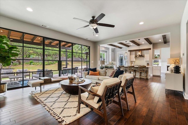 living room with a ceiling fan, dark wood-style floors, and recessed lighting