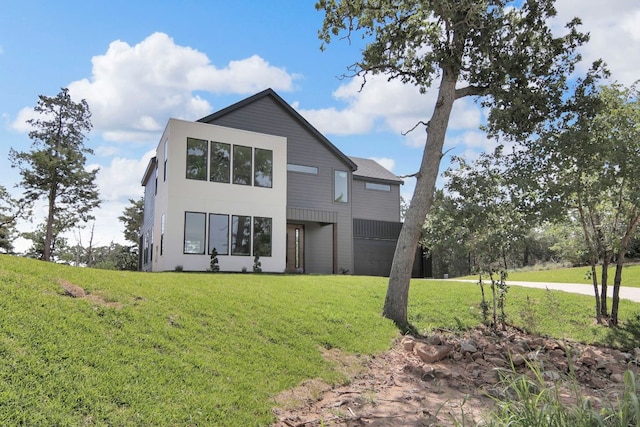 214 Ulupau Cir, Bastrop, TX 78602 - back of house with a lawn